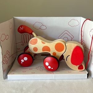 Child’s wooden toy it’s a pull along dog for 12 months and up
